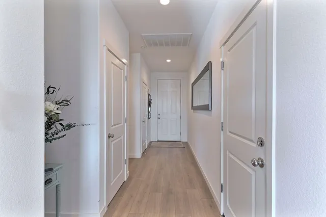 a living room with furniture fireplace and flat screen tv