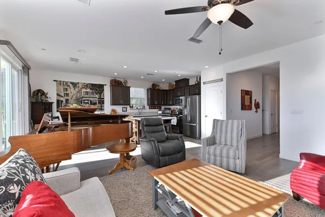 a kitchen with a table and chairs in it