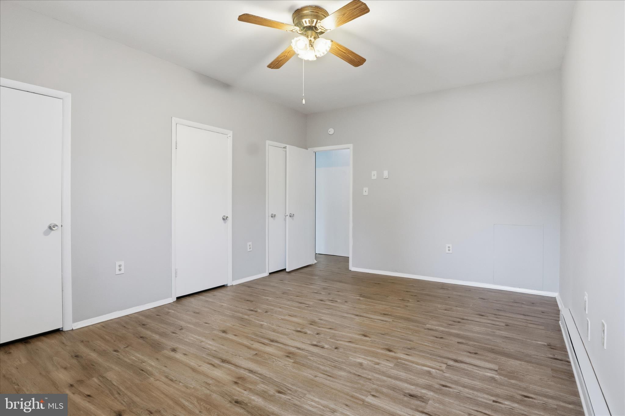3245 Rio Drive, Unit 107 Falls Church, VA 22041 - Photo 16 of 32 wooden floor in an empty room