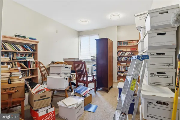 a view of a workspace with furniture