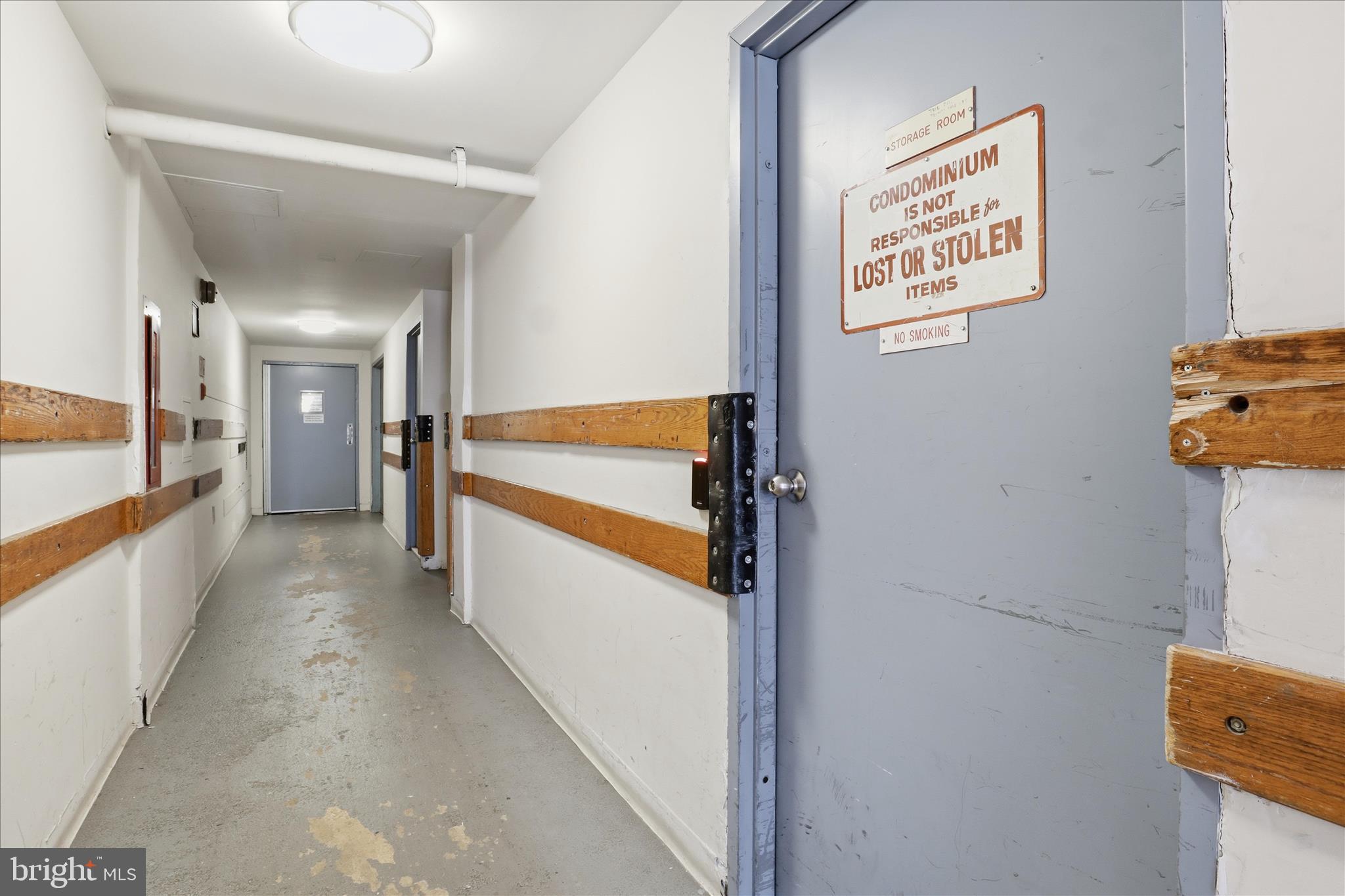 3245 Rio Drive, Unit 107 Falls Church, VA 22041 - Photo 22 of 32 a view of a hallway with seating area