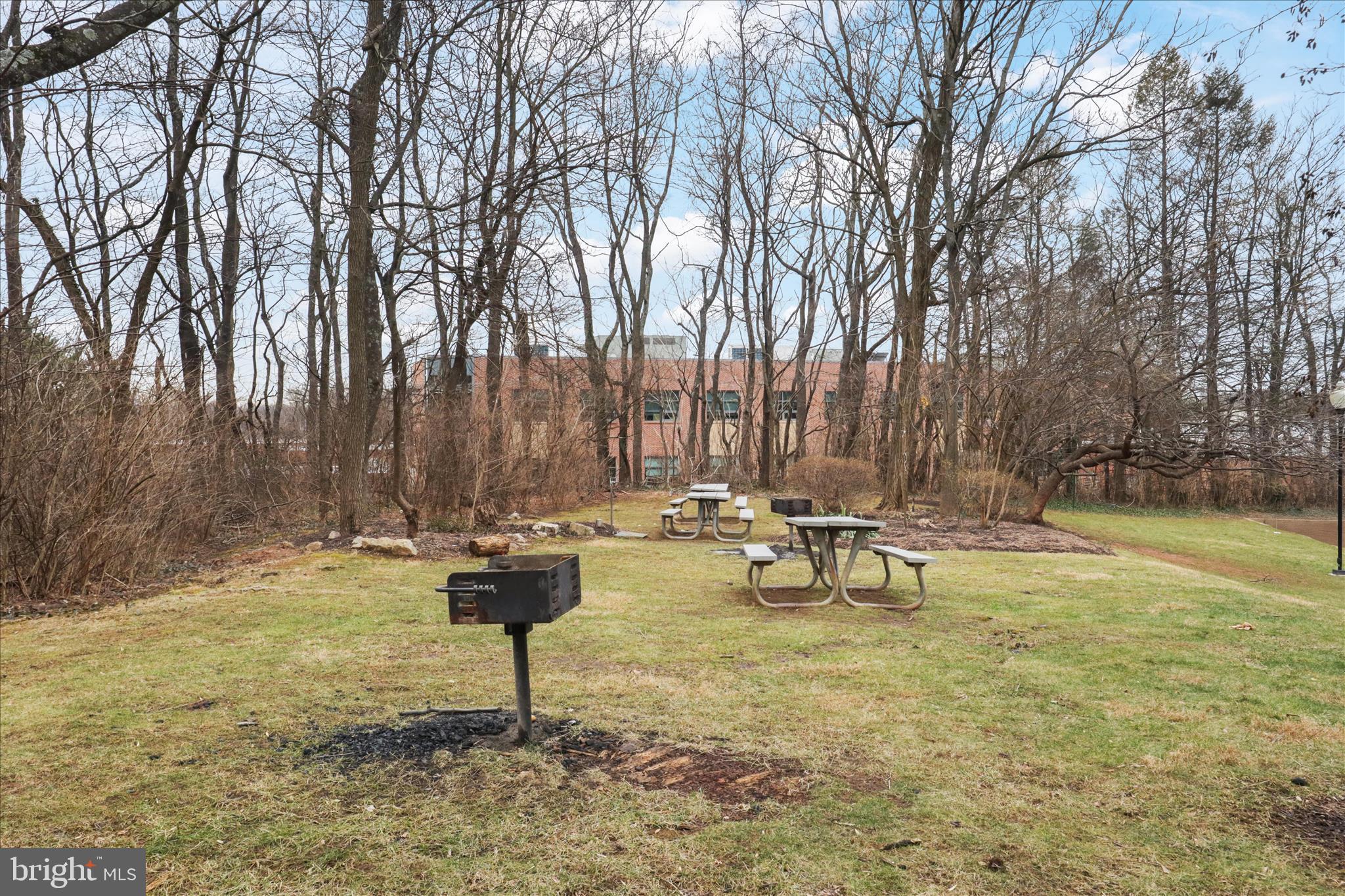 3245 Rio Drive, Unit 107 Falls Church, VA 22041 - Photo 27 of 32 a view of swimming pool with outdoor seating and trees