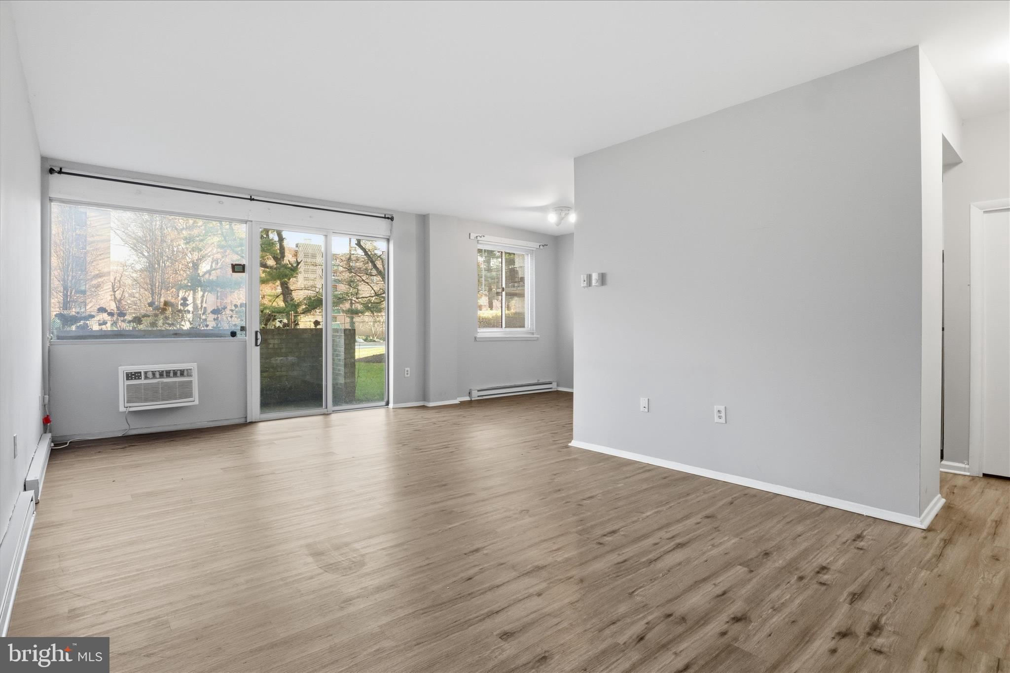 3245 Rio Drive, Unit 107 Falls Church, VA 22041 - Photo 5 of 32 a view of an empty room with a window