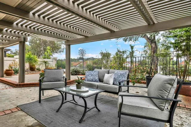 a outdoor living space with furniture and garden view