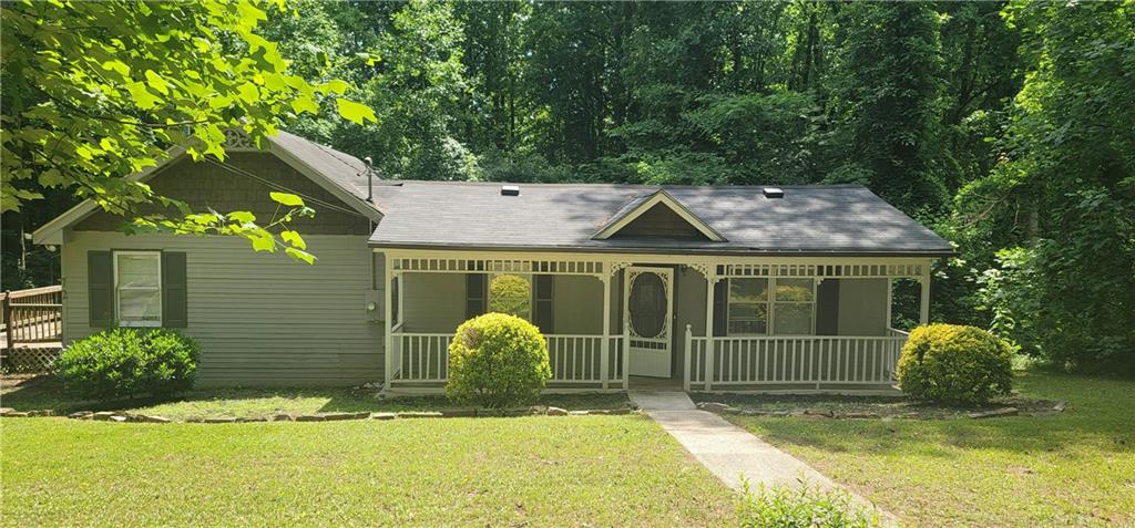 72 Towler Road Lawrenceville, GA 30046 - Photo 1 of 1 a view of a house with yard and garage