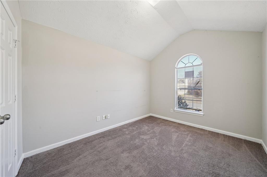 1443 Pebble Ridge Lane Hampton, GA 30228 - Photo 21 of 24 an empty room with windows