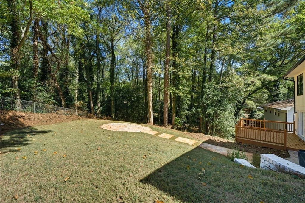 3920 Wedgefield Circle Decatur, GA 30035 - Photo 23 of 25 a view of a yard with wooden fence