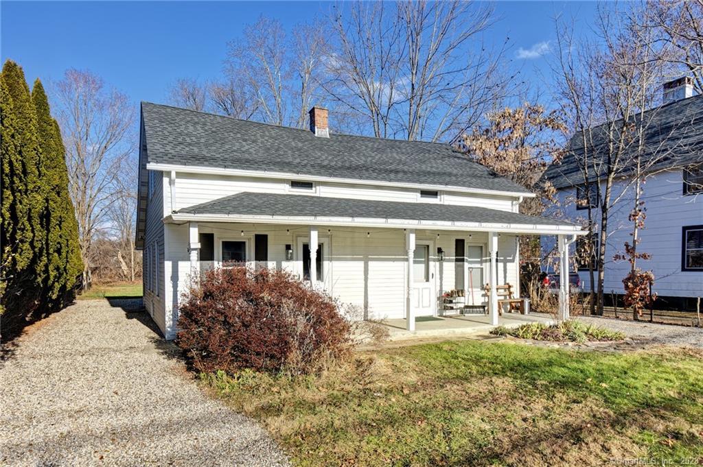 25 Maple Street Kent, CT 06757 - Photo 1 of 1 a front view of a house with a yard