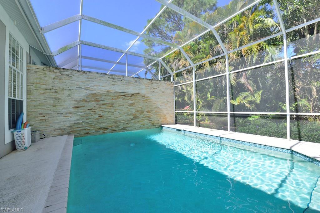 106 Cypress View Drive, Unit C8 Naples, FL 34113 - Photo 21 of 30 a view of outdoor space and yard