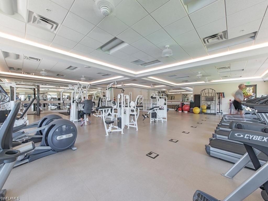 106 Cypress View Drive, Unit C8 Naples, FL 34113 - Photo 30 of 30 a view of a room with gym equipment