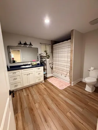 a kitchen with granite countertop a stove and a sink