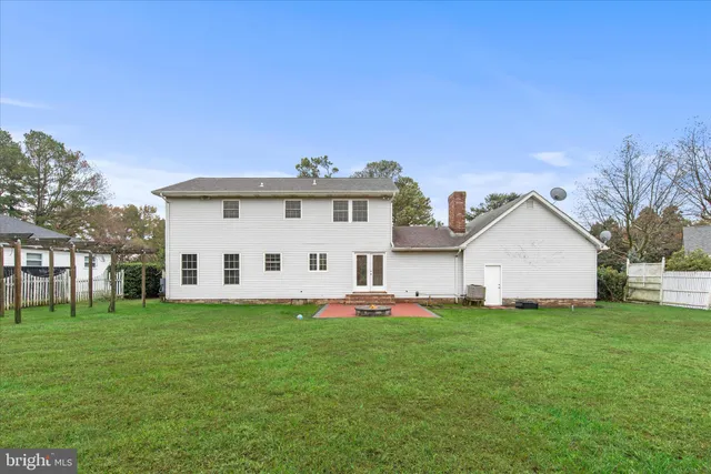 a view of a house with a big yard