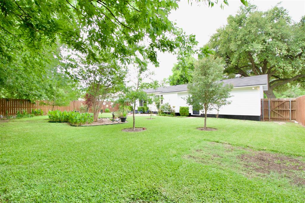 1307 North 65th Street Waco, TX 76710 - Photo 35 of 35 a view of a house with a backyard