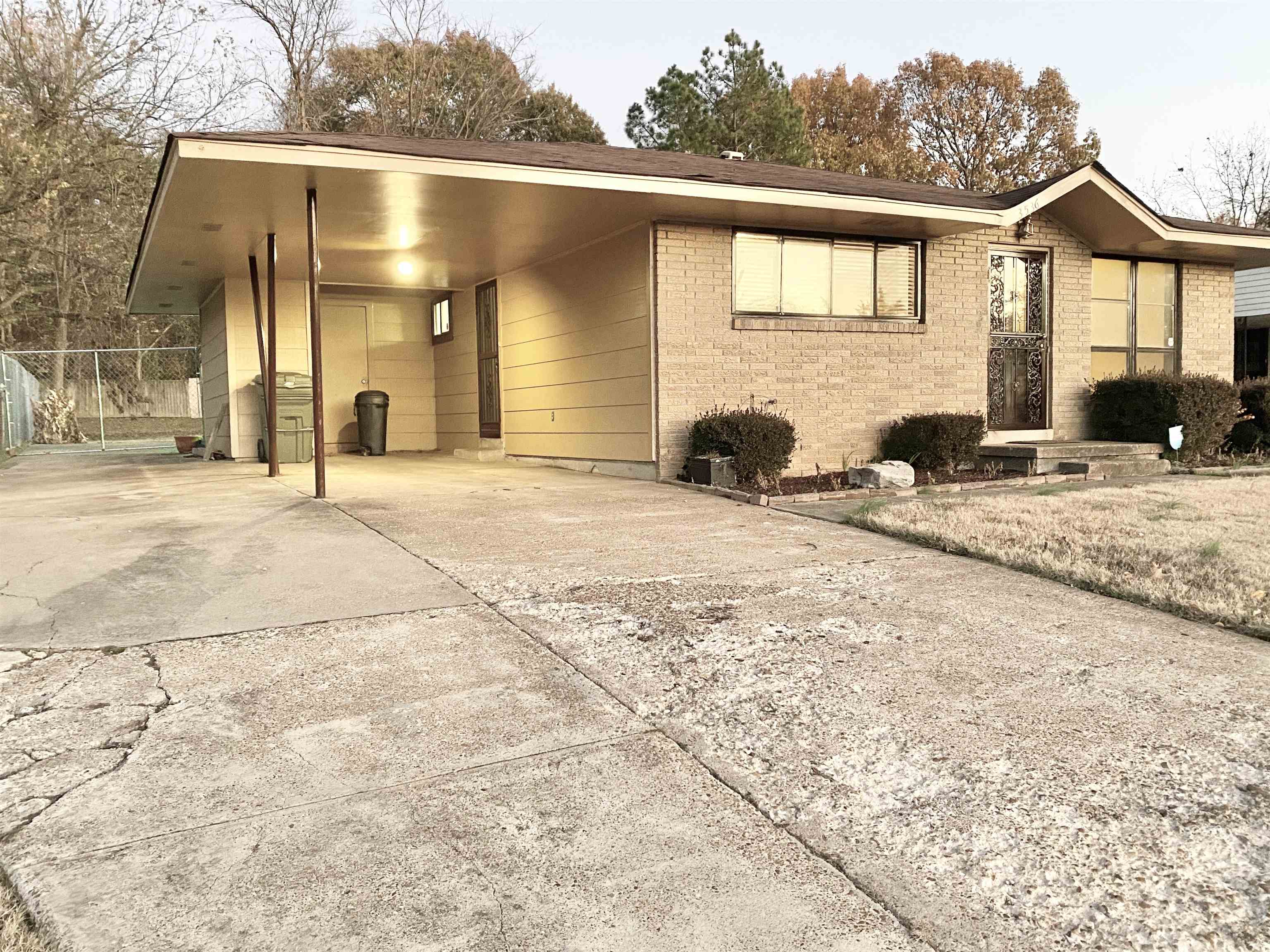 3536 West Horn Lake Road Memphis, TN 38109 - Photo 2 of 12 a view of a house with snow on the road
