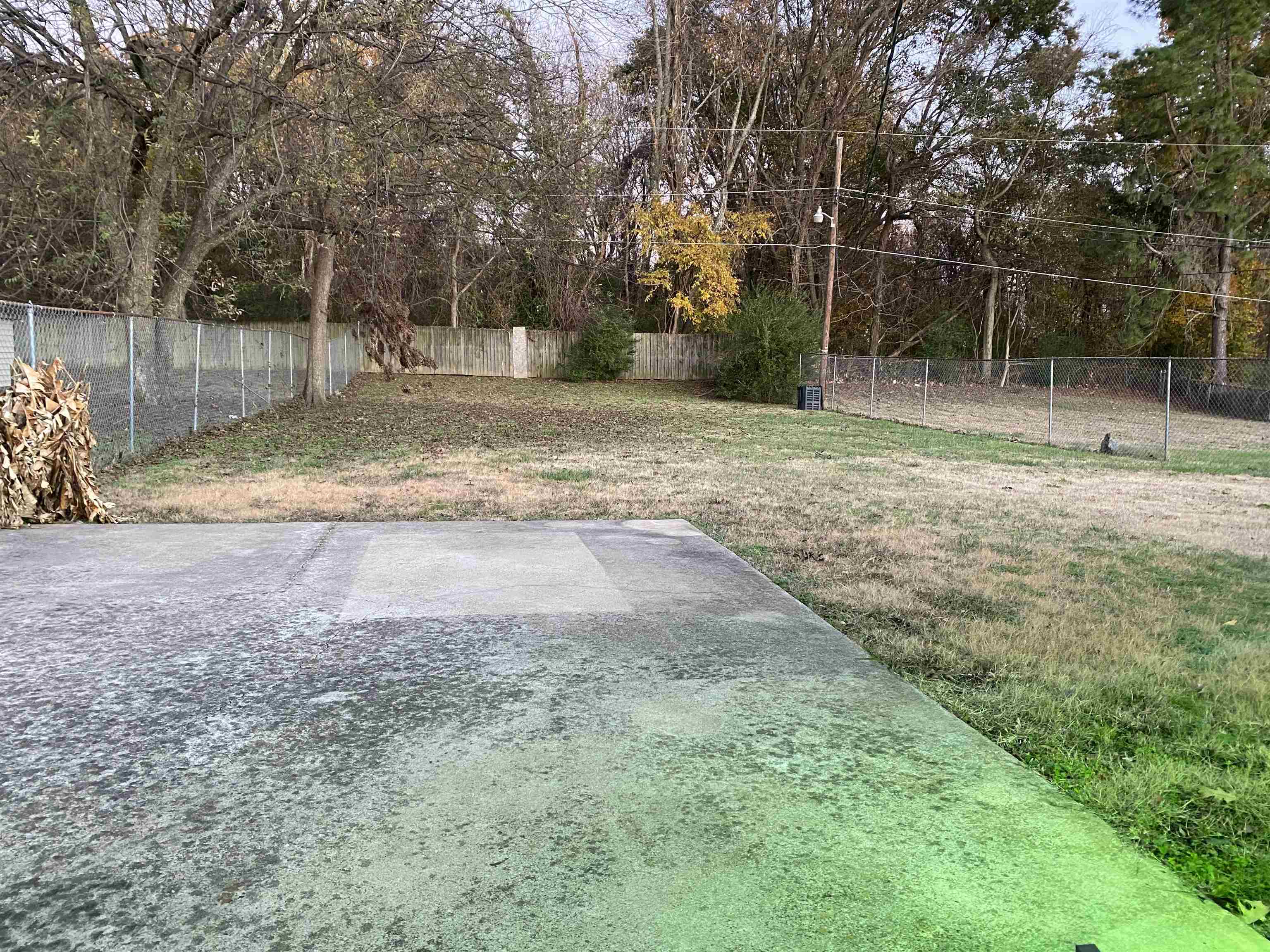 3536 West Horn Lake Road Memphis, TN 38109 - Photo 4 of 12 a backyard of a house with lots of green space