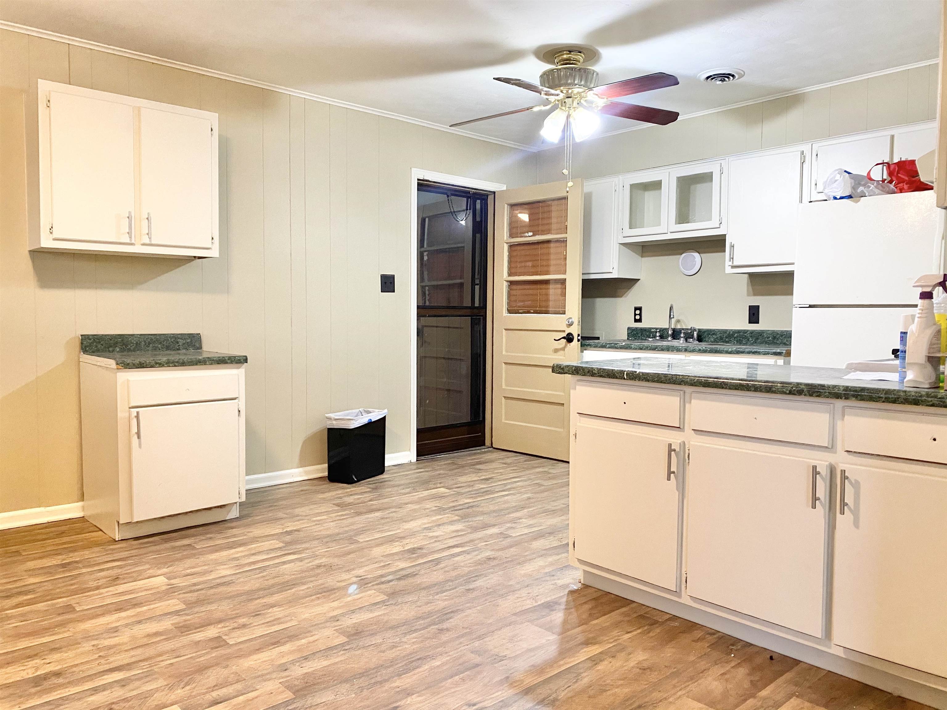 3536 West Horn Lake Road Memphis, TN 38109 - Photo 6 of 12 a kitchen with stainless steel appliances granite countertop a sink and cabinets