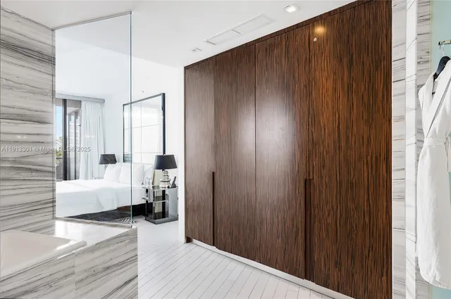a view of a livingroom with furniture and hardwood floor