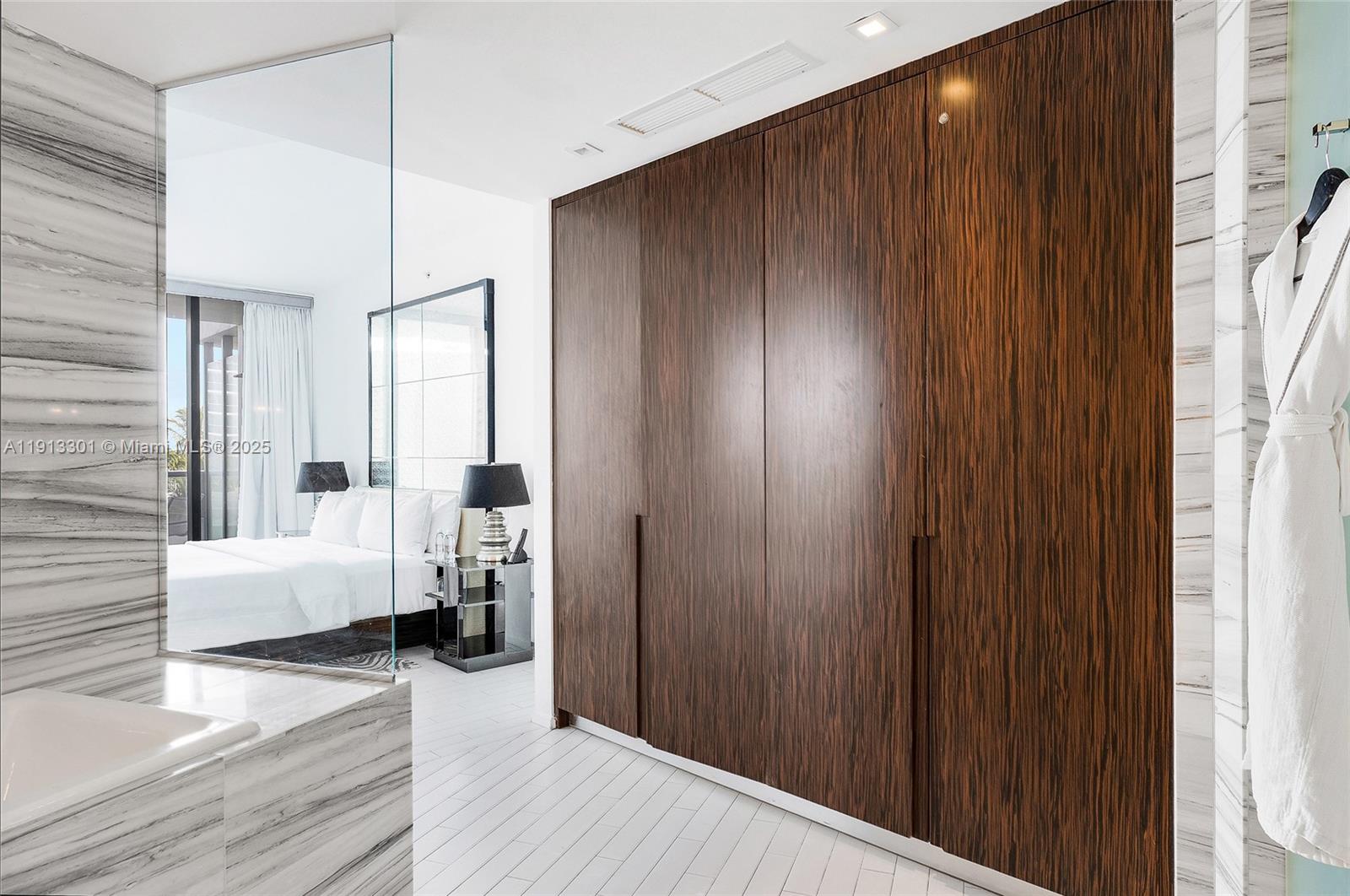 2201 Collins Avenue, Unit 431 Miami Beach, FL 33139 - Photo 14 of 20 a view of a livingroom with furniture and hardwood floor