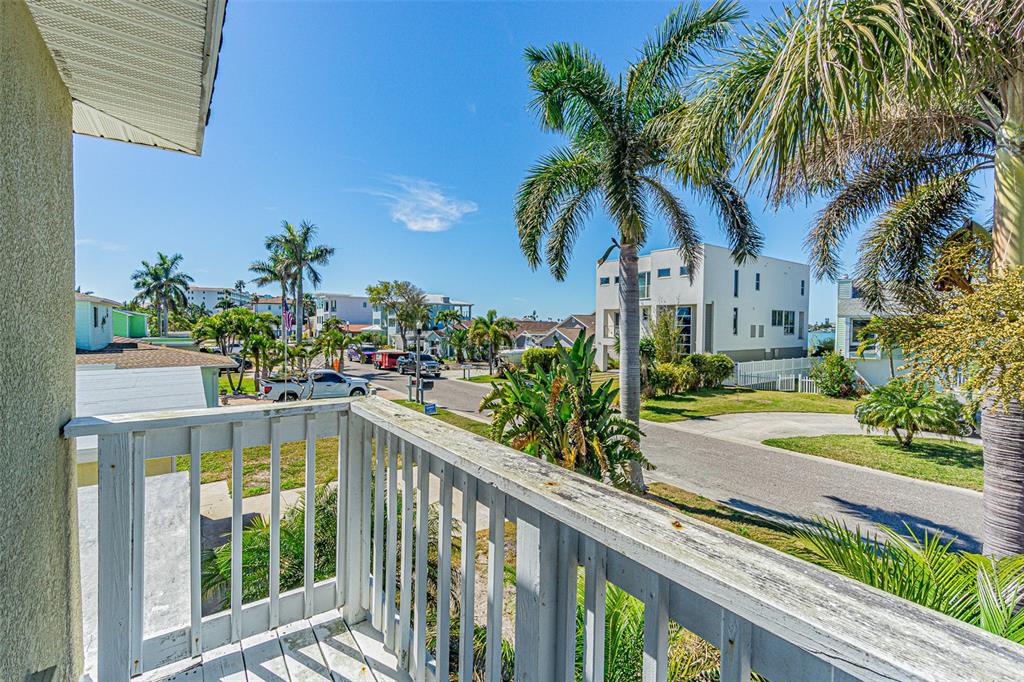 121 Wall Street Redington Shores, FL 33708 - Photo 19 of 38 a house with swimming pool