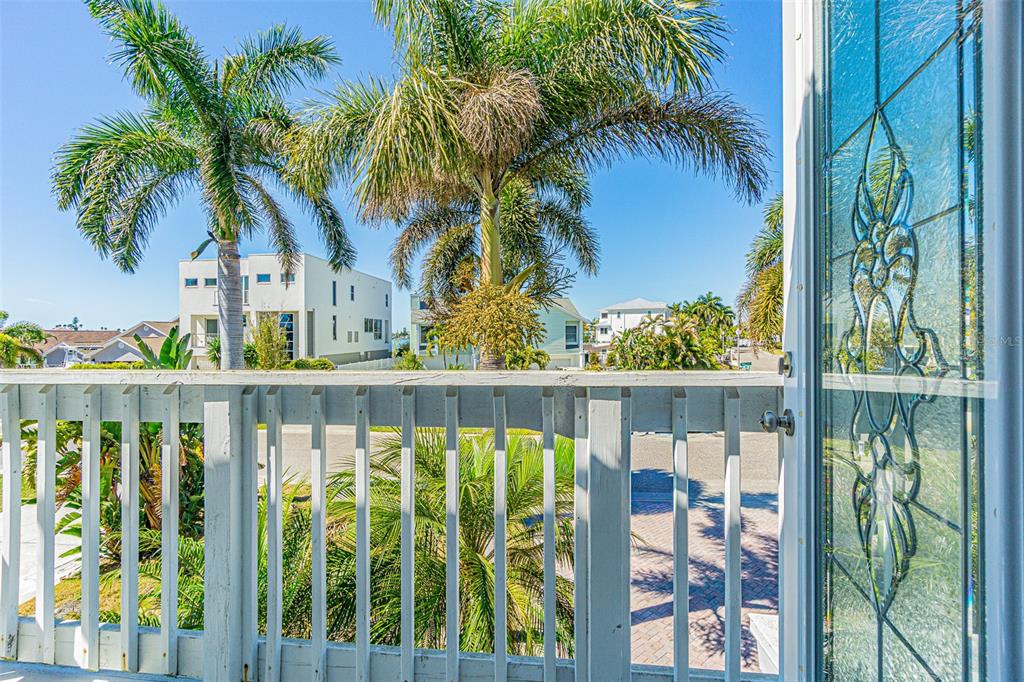 121 Wall Street Redington Shores, FL 33708 - Photo 20 of 38 a view of a balcony with lake view