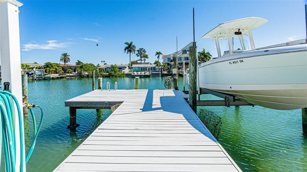 121 Wall Street Redington Shores, FL 33708 - Photo 5 of 38 a park view with a wooden floor and lake view