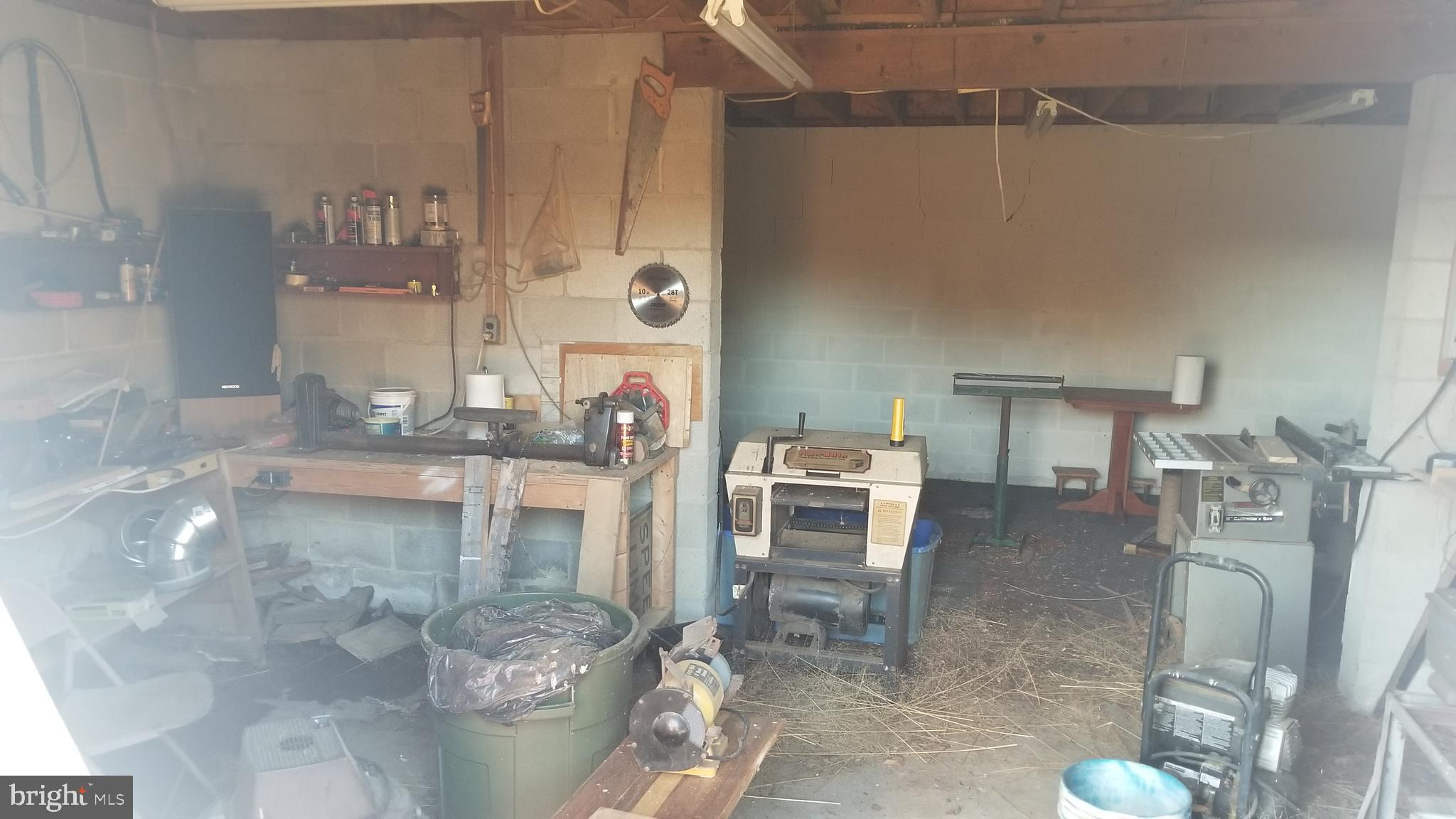 15512 Baden Naylor Road Brandywine, MD 20613 - Photo 24 of 62 Workshop w/wood stove (old tobacco stripping rm)