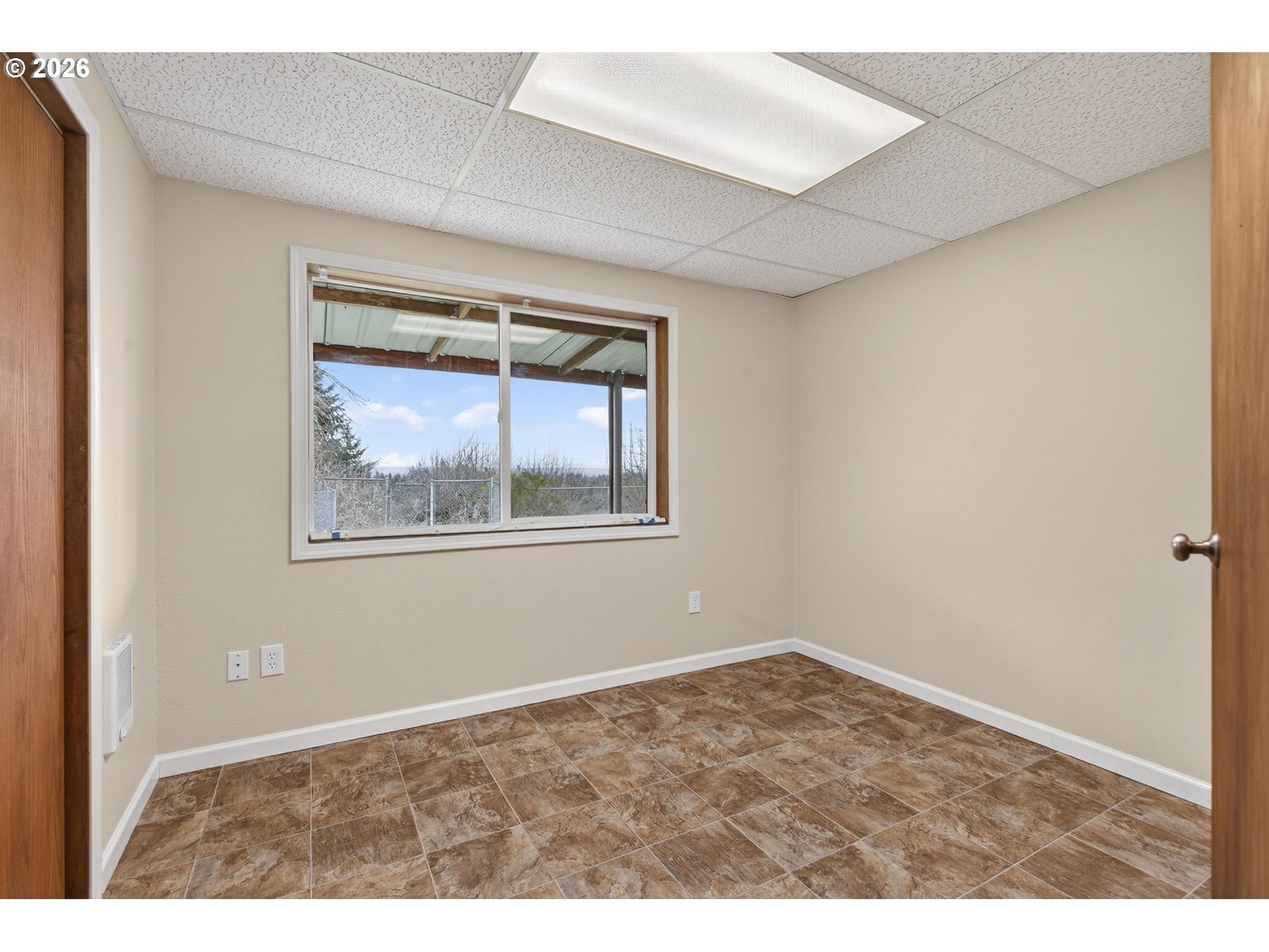 33501 Blaha Road Warren, OR 97053 - Photo 30 of 48 an empty room with a window