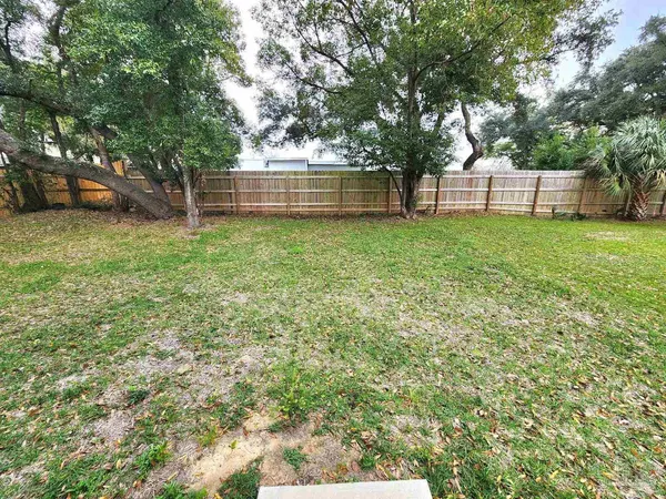 a view of outdoor space with deck and garden