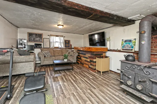 a kitchen with stainless steel appliances granite countertop a sink and wooden cabinets
