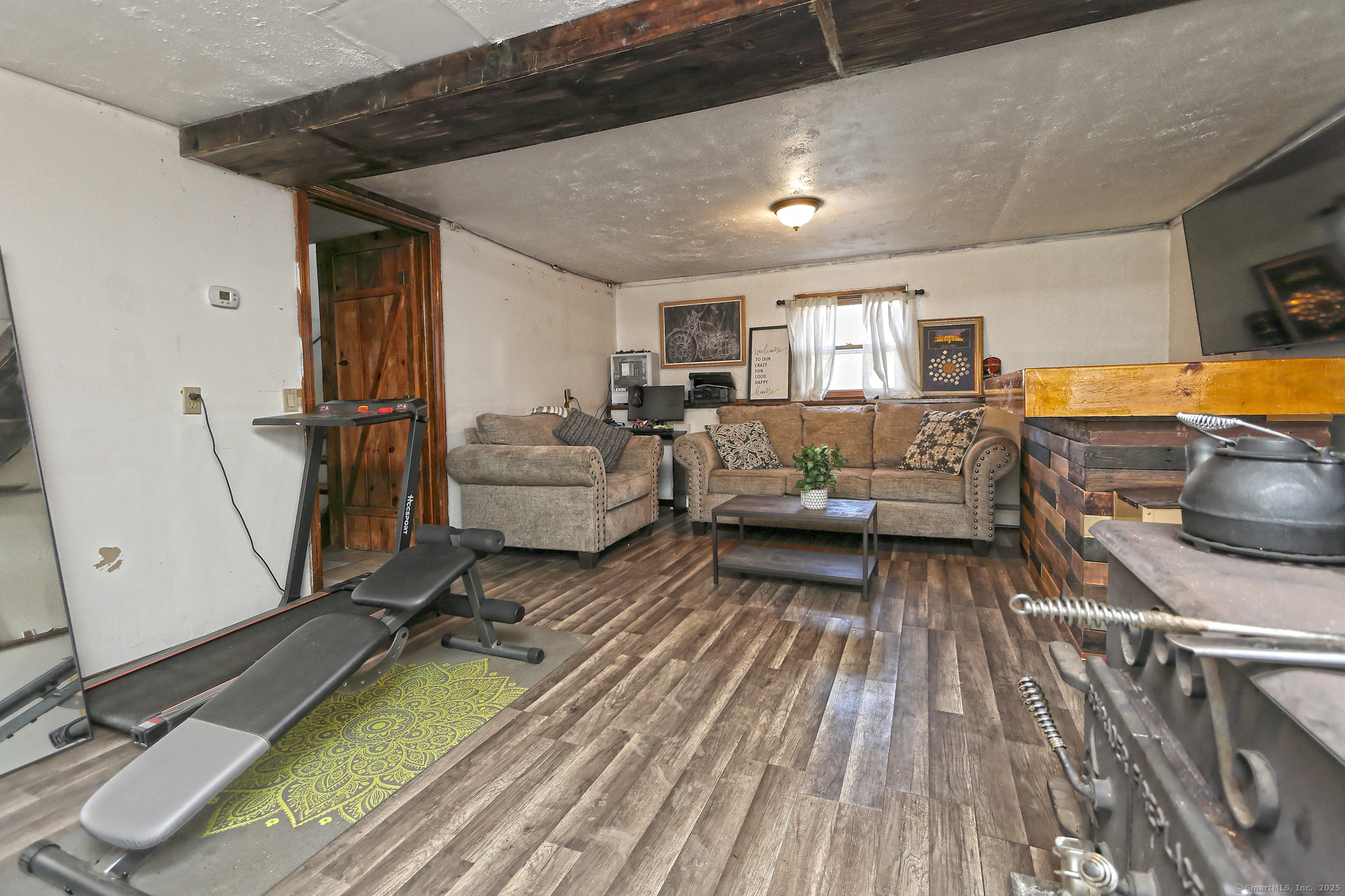 463 Mulberry Street Naugatuck, CT 06770 - Photo 11 of 21 a living room with furniture and a wooden floor