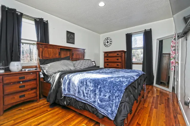 a bathroom with a sink a vanity and a mirror