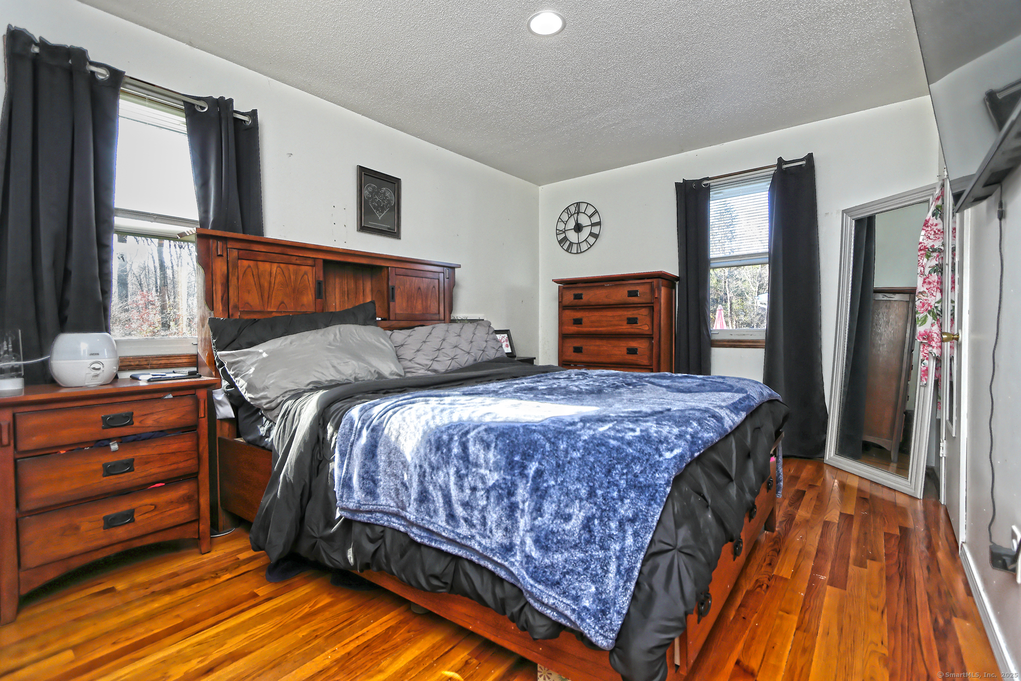 463 Mulberry Street Naugatuck, CT 06770 - Photo 14 of 21 a bedroom with a bed and a dresser