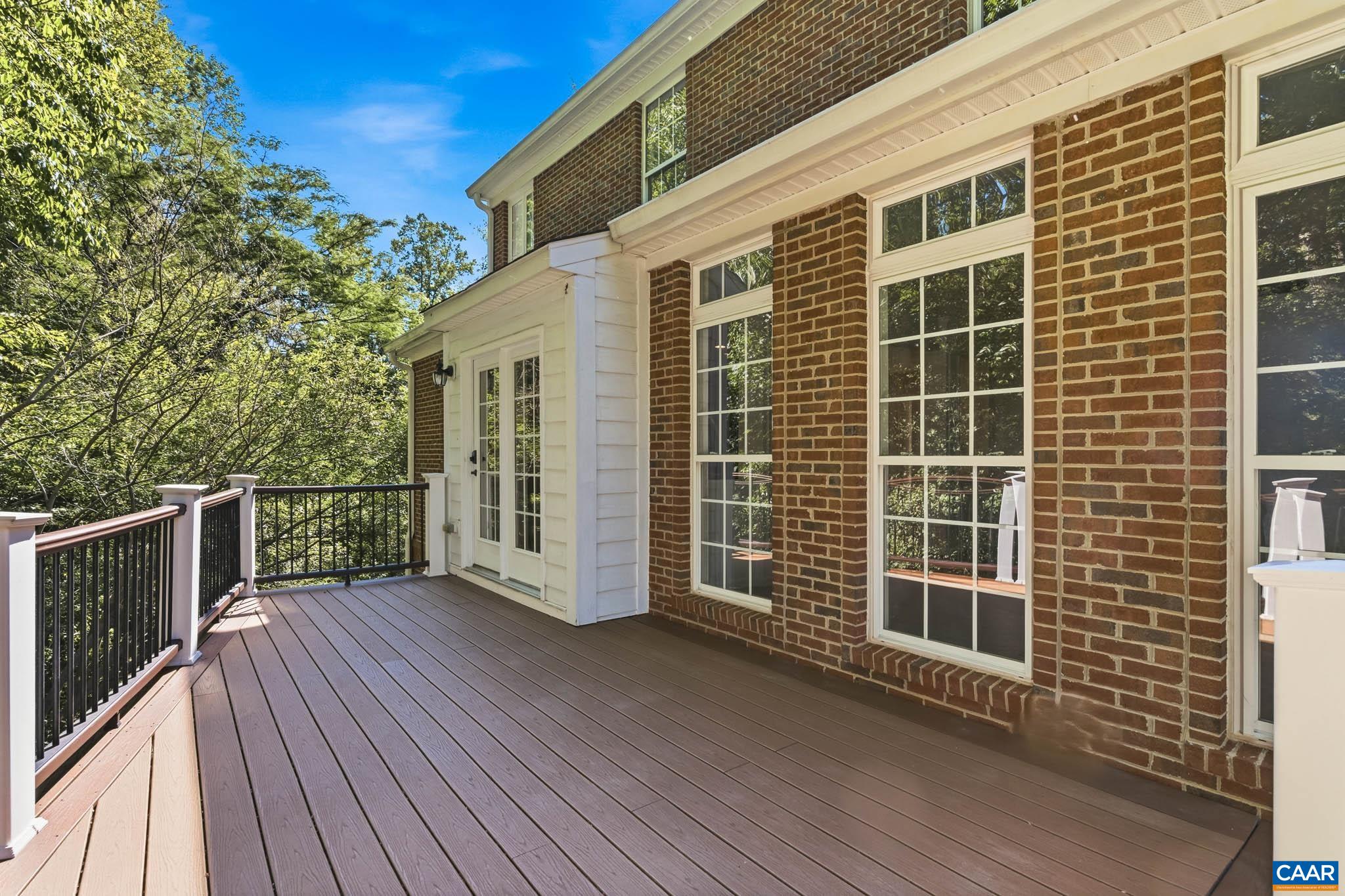 700 Rainier Road Charlottesville, VA 22903 - Photo 39 of 41 Large, peaceful, elevated deck directly off the kitchen/family room, overlooking mature trees.