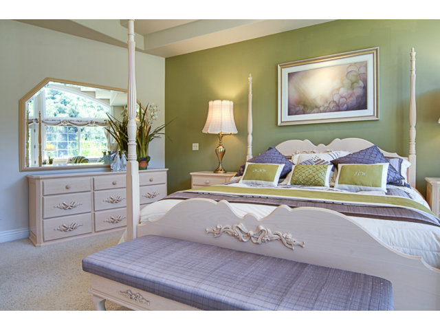 14065 Arnerich Road Los Gatos, CA 95032 - Photo 15 of 25 a bedroom with a bed and a window