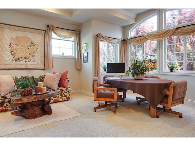 14065 Arnerich Road Los Gatos, CA 95032 - Photo 18 of 25 a living room with furniture and a large window