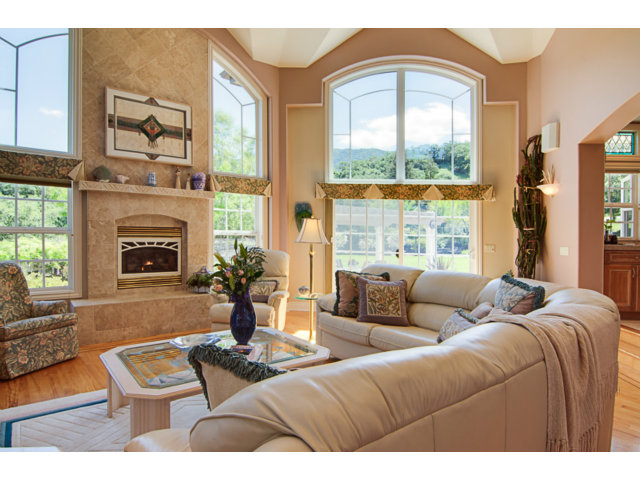 14065 Arnerich Road Los Gatos, CA 95032 - Photo 4 of 25 a living room with furniture and a fireplace