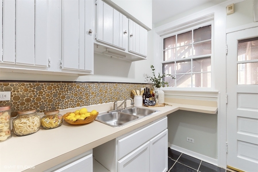 1316 Maple Avenue, Unit F1 Evanston, IL 60201 - Photo 6 of 13 a kitchen with a sink and cabinets