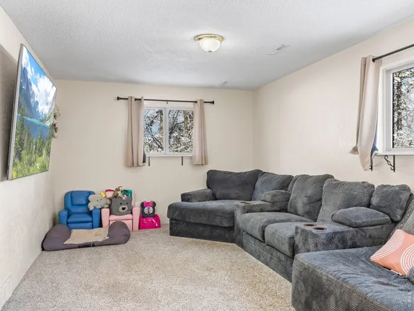 a living room with furniture and a couch