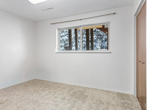 a living room with furniture and window