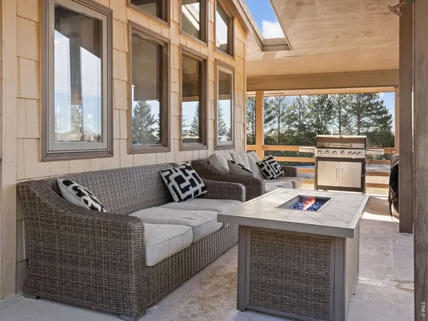 a view of a yard covered in snow