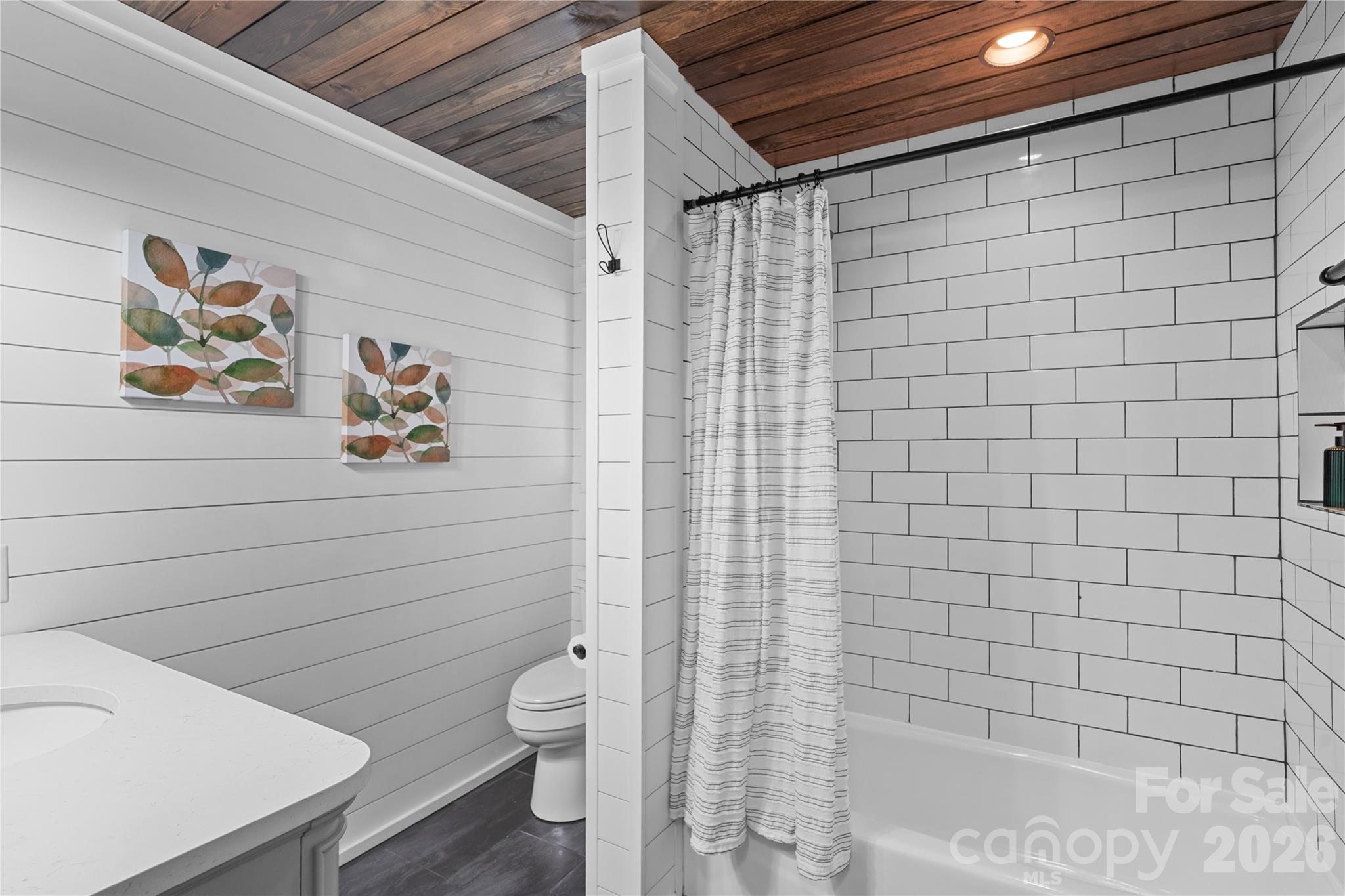 1335 Blacksnake Road Stanley, NC 28164 - Photo 12 of 31 a bathroom with a toilet and shower
