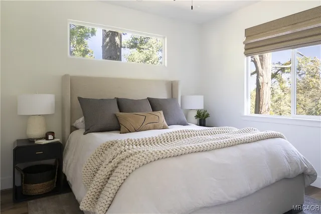 a view of yard from balcony with seating space