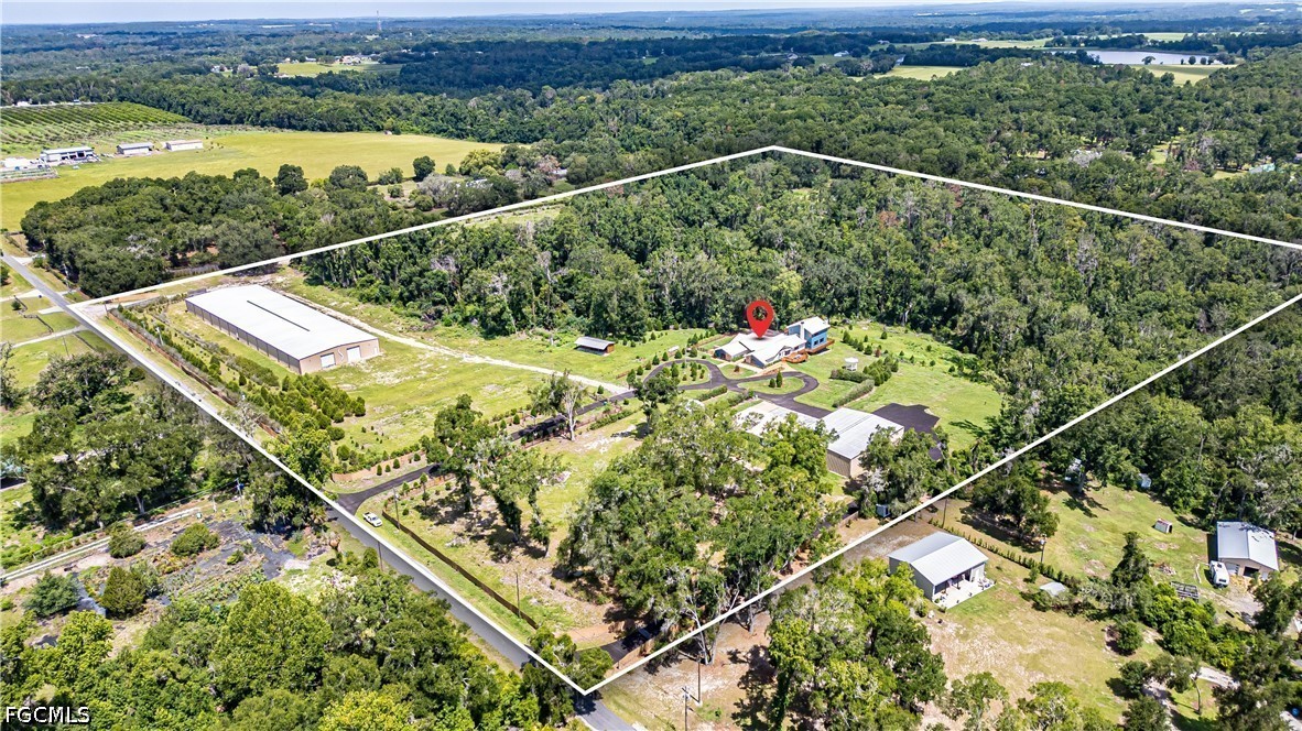 27255 Hickory Hill Road Brooksville, FL 34602 - Photo 46 of 50 a view of a tennis court