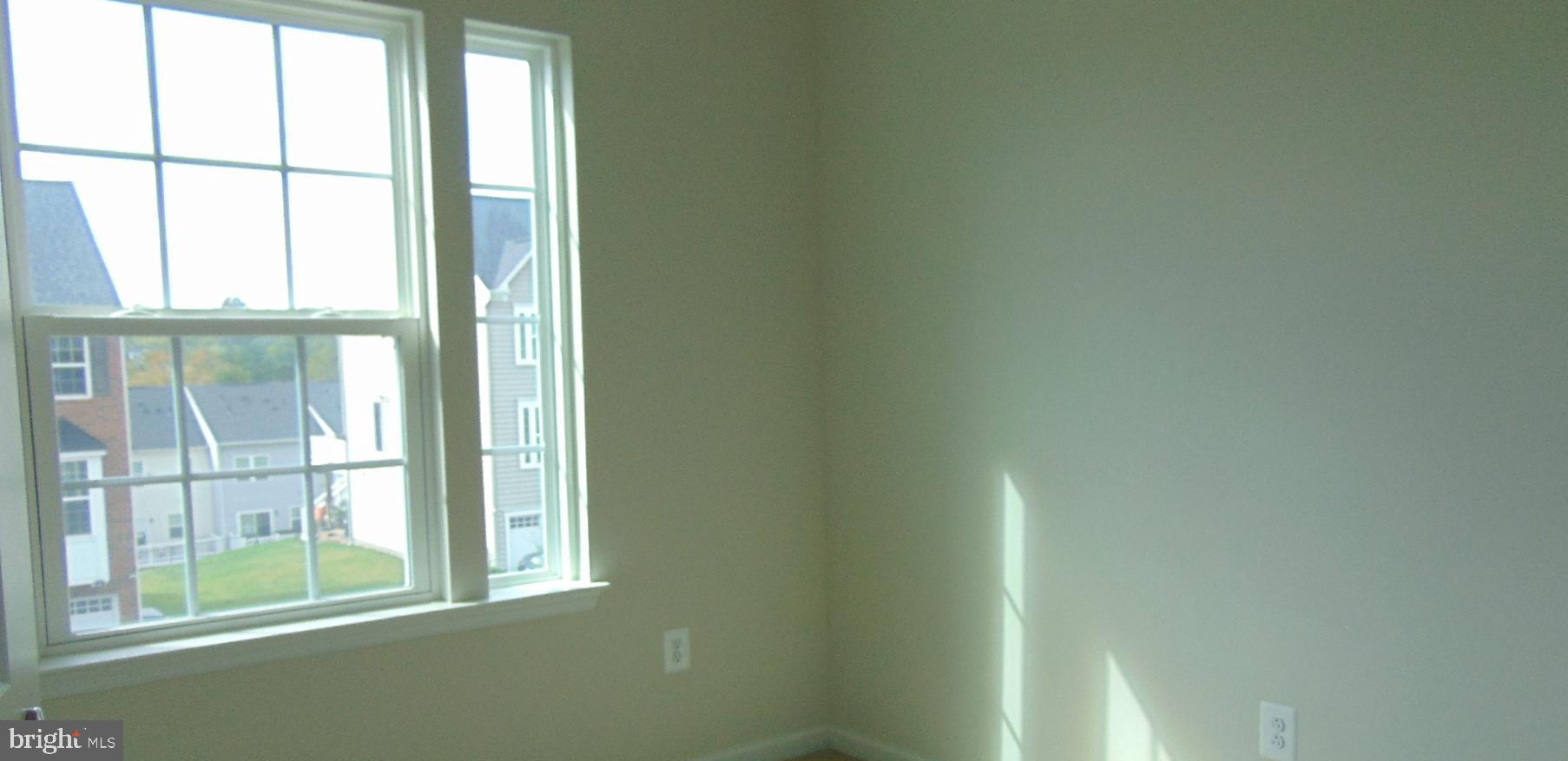 1813 Wind Gate Road Baltimore, MD 21227 - Photo 20 of 44 a view of a window in an empty room