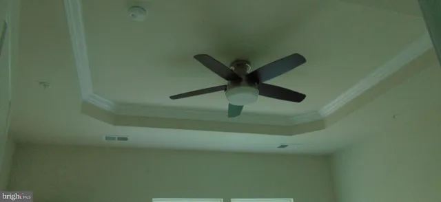 a view of a room that has a window in it