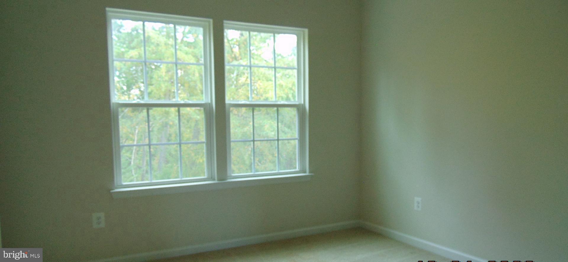 1813 Wind Gate Road Baltimore, MD 21227 - Photo 26 of 40 a view of a room that has a window in it
