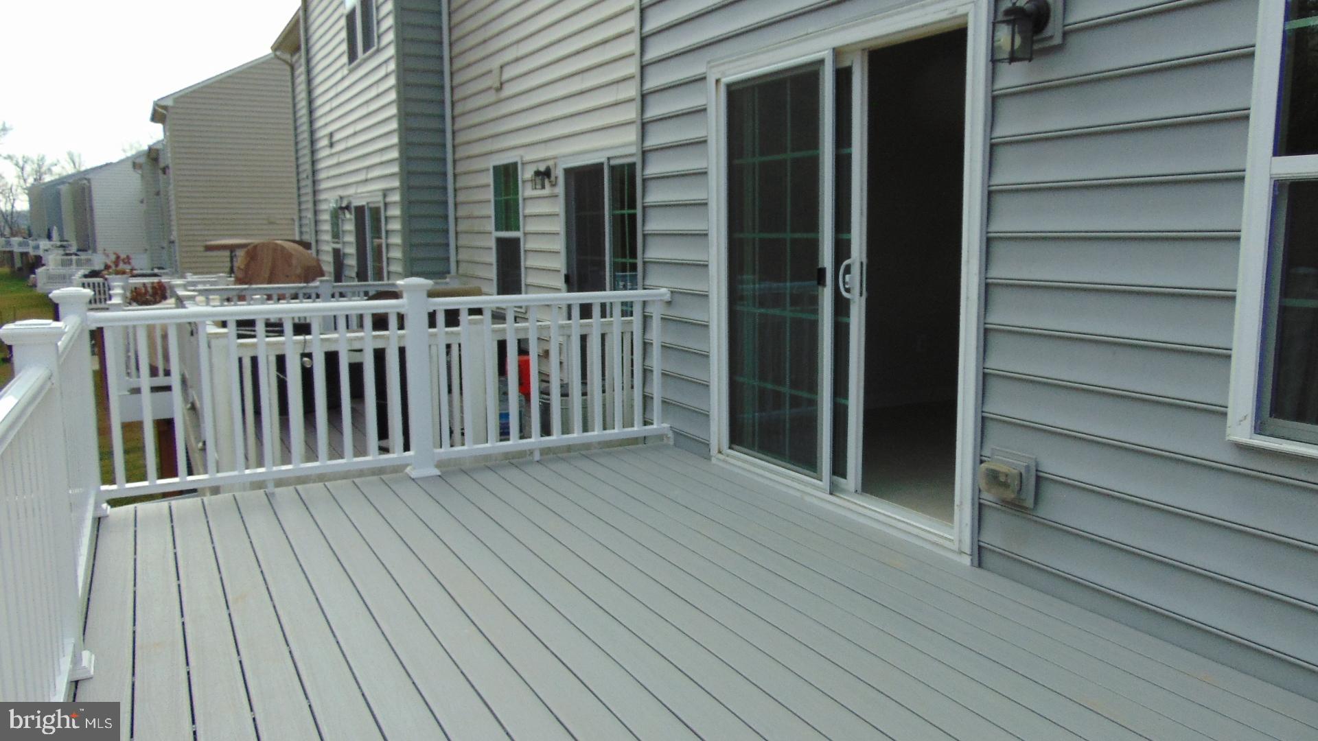 1813 Wind Gate Road Baltimore, MD 21227 - Photo 44 of 44 a view of a house with a deck