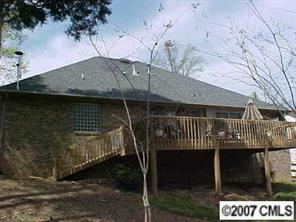 606 Keowee Lane Fort Mill, SC 29708 - Photo 3 of 8 a front view of a house with a yard