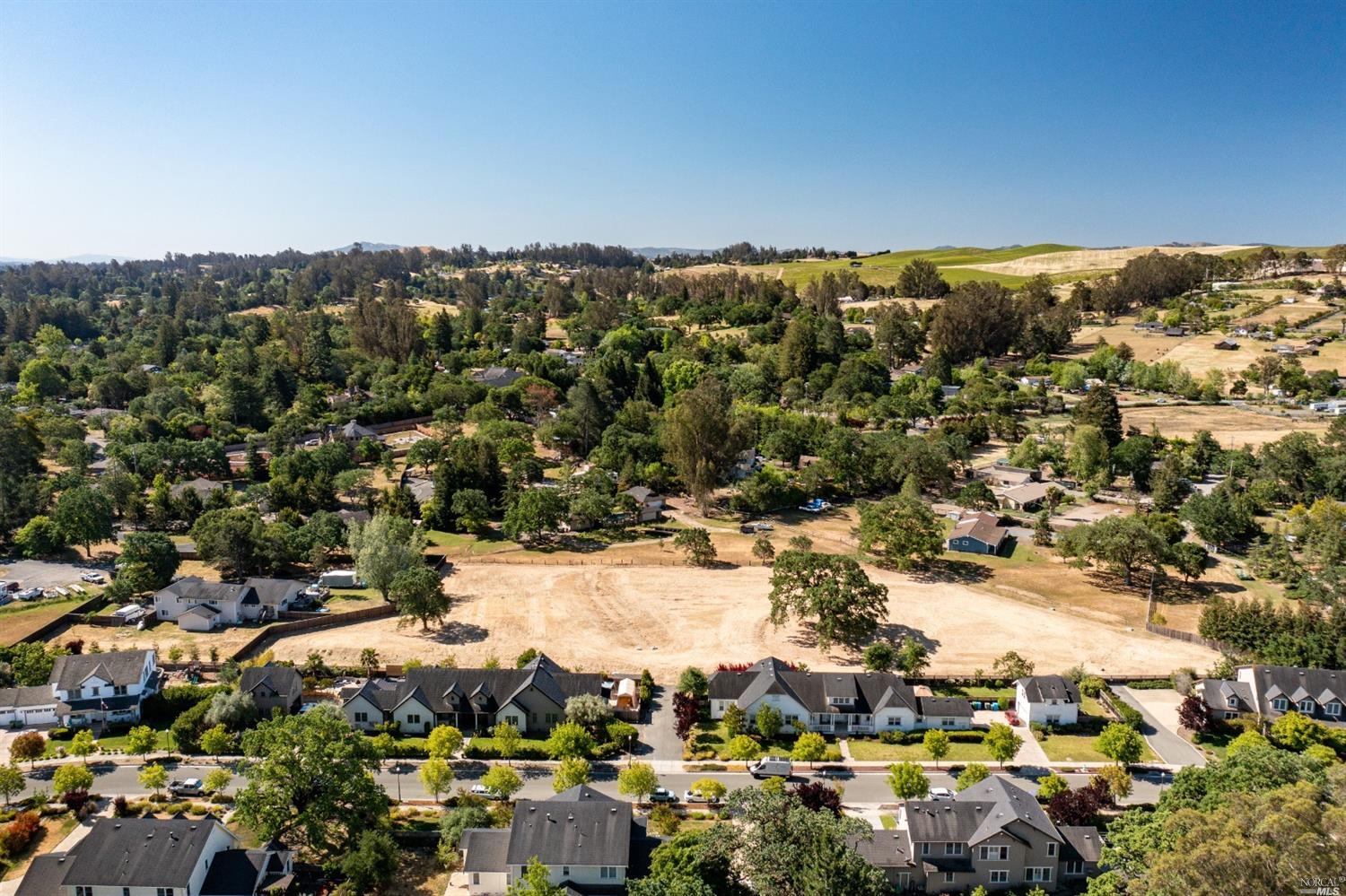 Arial view of all three lots and the neighborhoods surrounding this lovely tree-loaded area of West Cotati.