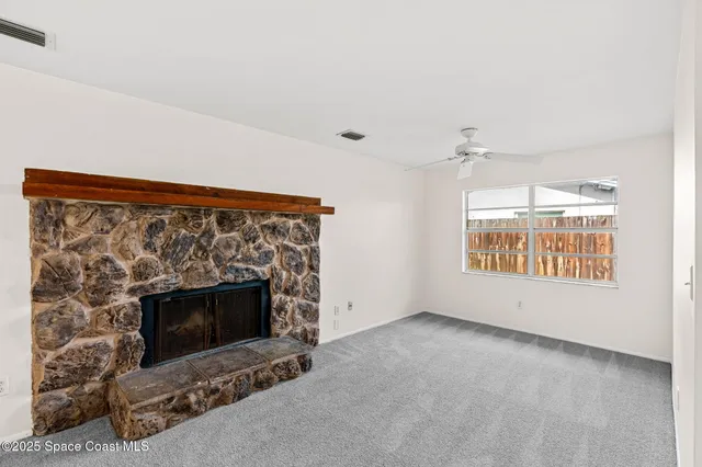 a bathroom with a sink a toilet a mirror and shower